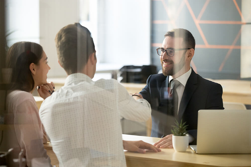 Young Couple meeting with a Wealth Advisor
