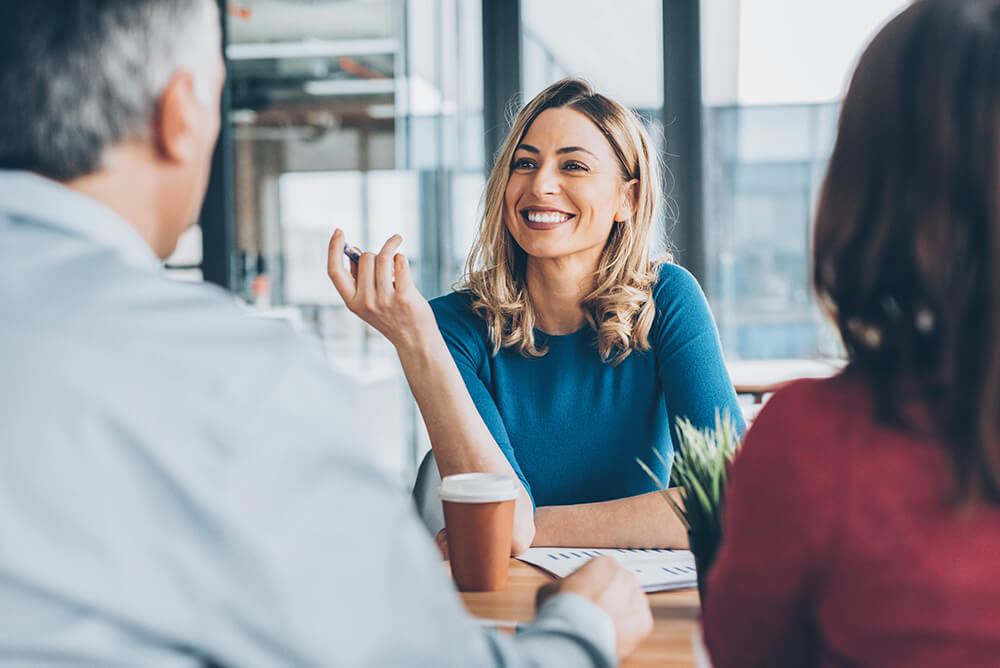 Wealth Advisor giving advice to clients